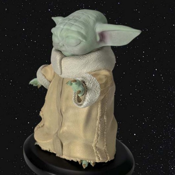 Star Wars figurine - Grogu using the force - The Mandolarian